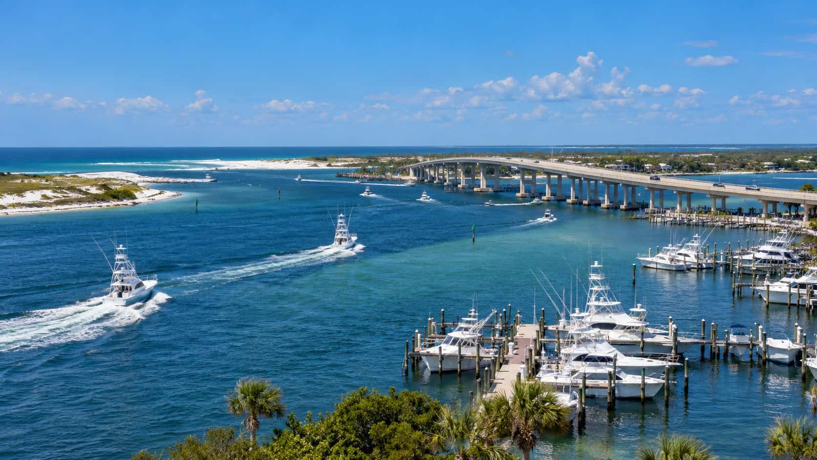 Marina, charter boats and bridge at Perdido Pass in Orange Beach, Alabama